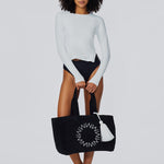 Cabana Beach Bag in Black held by a model