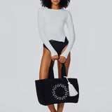 Cabana Beach Bag in Black held by a model