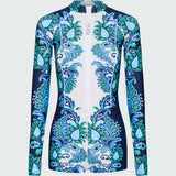 Long-sleeve one piece swimsuit in a blue and green floral pattern on a white background