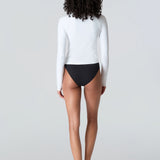 Rear view of woman wearing Sasha tee in White and Belle bikini in Black