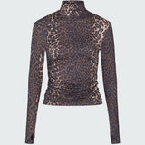 A long-sleeve mock neck rashguard in leopard