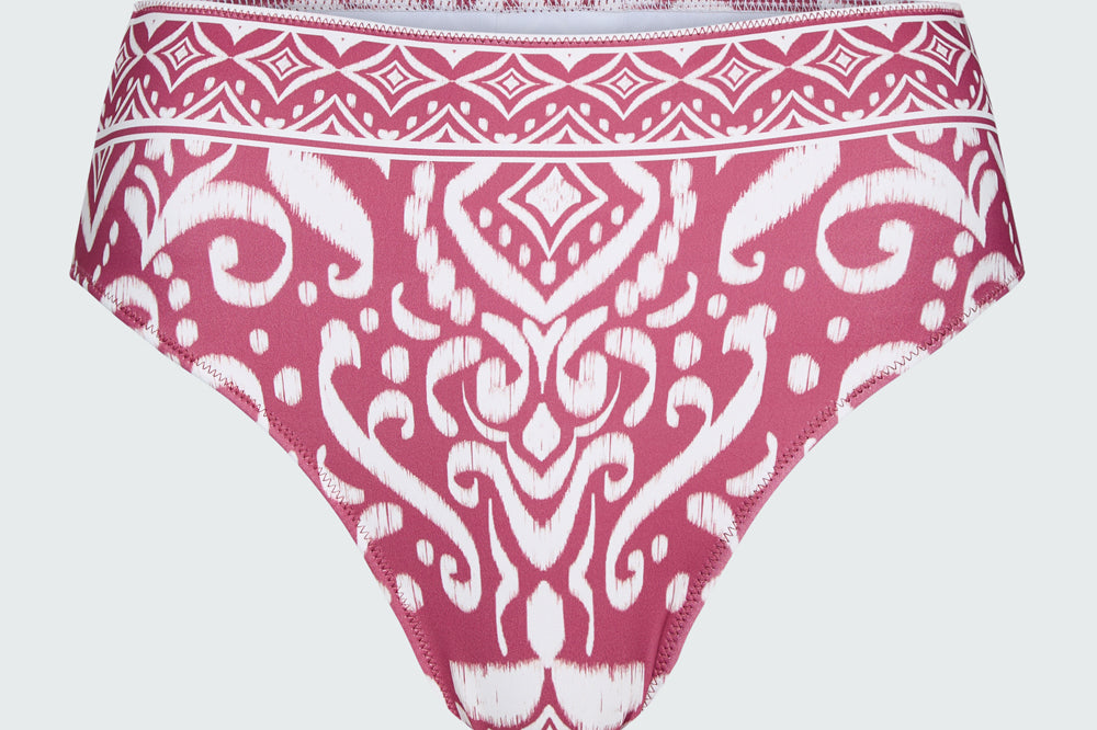 Watskin Belle bikini bottom in Dusty Rose Ikat shown flat against a light  background