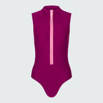 Sleeveless bodysuit in dark berry with pink zipper.