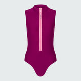 Sleeveless bodysuit in dark berry with pink zipper.