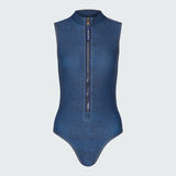 A sleeveless denim bodysuit with a  mock neck and half-zip neckline.