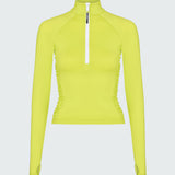 A lime green long-sleeve 1/2 zip rashguard with side ruching