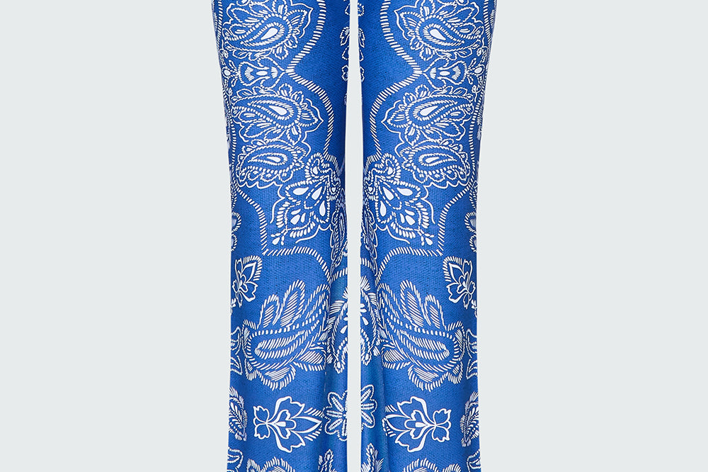 Blue and white bandana printed flare pants.