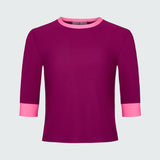 A short sleeve top in dark berry swim tee with contrasting pink trim.
