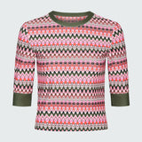 Product flat of a pink and green wavy striped patterned short sleeve swim top with green sleeve cuff