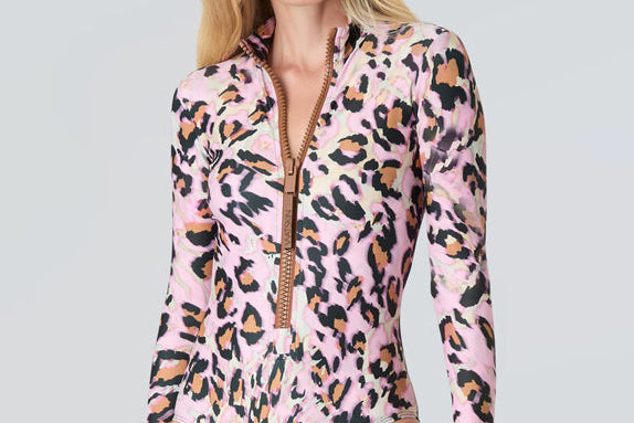 Female model wearing Watskin Ryann bodysuit in Pink Leopard 