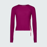 Long sleeve sun protective tee in dark berry with pink side zipper.