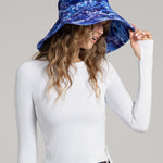 Watskin Sasha Hat in Tie Dye Closeup with Nadal wearing a White Top