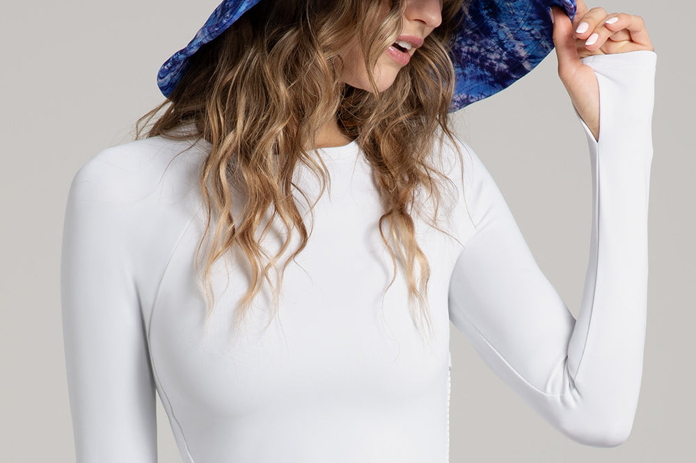 Watskin Sasha Hat in Tie Dye Closeup with Nadal wearing a White Top