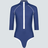 Blue and white swimsuit with a white zipper and trim on a gray background